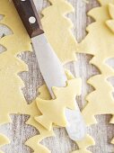 Christmas tree shapes cut out of sweet pastry