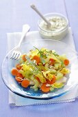 Salad of turkey breast, celery, carrots and sunflower seeds