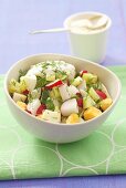 Cucumber, radish and egg salad with dill and sour cream
