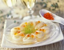 Scallop carpaccio with salmon caviar