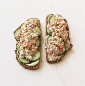 Two cucumber sandwiches with pepper tartare