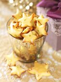 Star biscuits with gold dragees for Christmas