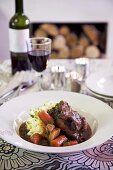 Braised oxtail with mashed potato and root vegetables