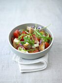 Tomato and bread salad with rocket