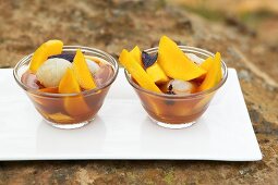 Mango and lychee salad with basil in rooibos tea (South Africa)