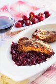 Steaks with cherry compote
