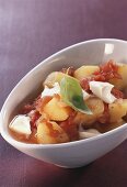 Potatoes with tomatoes and mozzarella