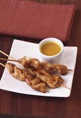 Chicken kebabs with coconut dip