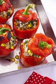 Peppers stuffed with rice, sweetcorn and mushrooms