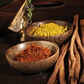 Safflower (saffron substitute), curry powder and cinnamon sticks