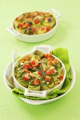 Stuffed courgette rolls with red pepper and melted cheese