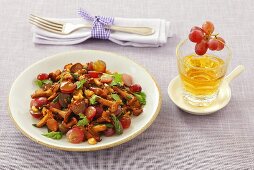 Fried chanterelles with grapes
