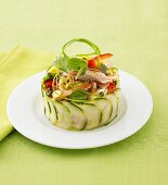 Asian chicken salad with papaya in cucumber ring