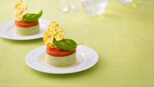 Basil mousse with tomato jelly and Parmesan crisps