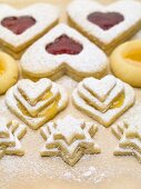 Assorted jam biscuits with icing sugar