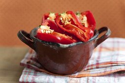 Red peppers in an enamel pot