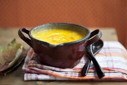 Cream of pumpkin soup with black salsify
