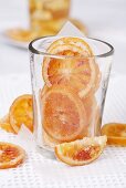 Candied orange slices in glass