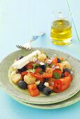 Tomato and olive salad with feta and croutons