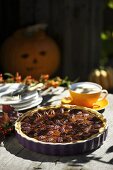 Pumpkin pie with pecan nuts for Halloween