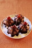 Chocolate puddings with cherries