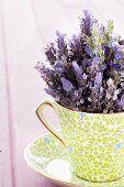 Bunch of lavender in a cup and saucer