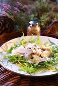 Mushroom carpaccio with rocket