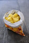 Frozen pineapple chunks in packaging