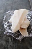 Frozen halibut fillets with clingfilm