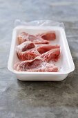 Frozen lamb chops in polystyrene tray