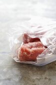 Frozen turkey in freezer bag