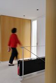 Woman walking through room (Villa Bamboo, Southern France)