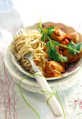 Sweet and sour chicken with Chinese noodles