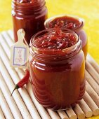 Strawberry and chili jam in jam jars