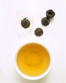 Pressed green tea (unpacked tea nests)