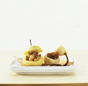Apple with nut stuffing and pear with raisins stuffing