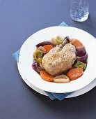 Braised chicken on bed of vegetables
