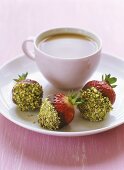 Strawberries dipped in chocolate & chopped pistachios