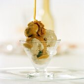 Pistachio ice cream with chocolate and caramel sauce