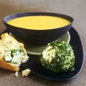 Pumpkin and almond soup and herb cheese balls