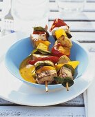 Meat and vegetable kebabs with coconut and chili marinade