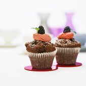 Chocolate muffins with strawberry and blackberry