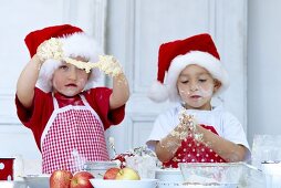 Two 'young bakers' kneading dough