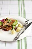 Fried pork fillets with mashed herb potatoes