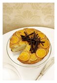 Marmeladenkuchen mit Orangenschalen und Schokoröllchen