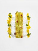 Tea pasta with grilled pineapple and milk foam (molecular gastronomy)