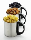 Various types of raisins in cups