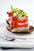 Layered dessert with redcurrent jelly and cream