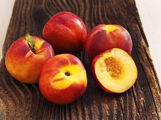 Nectarines on a wooden surface