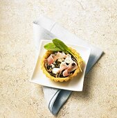 A tartlet with sorrel, Parma ham and goat's cheese